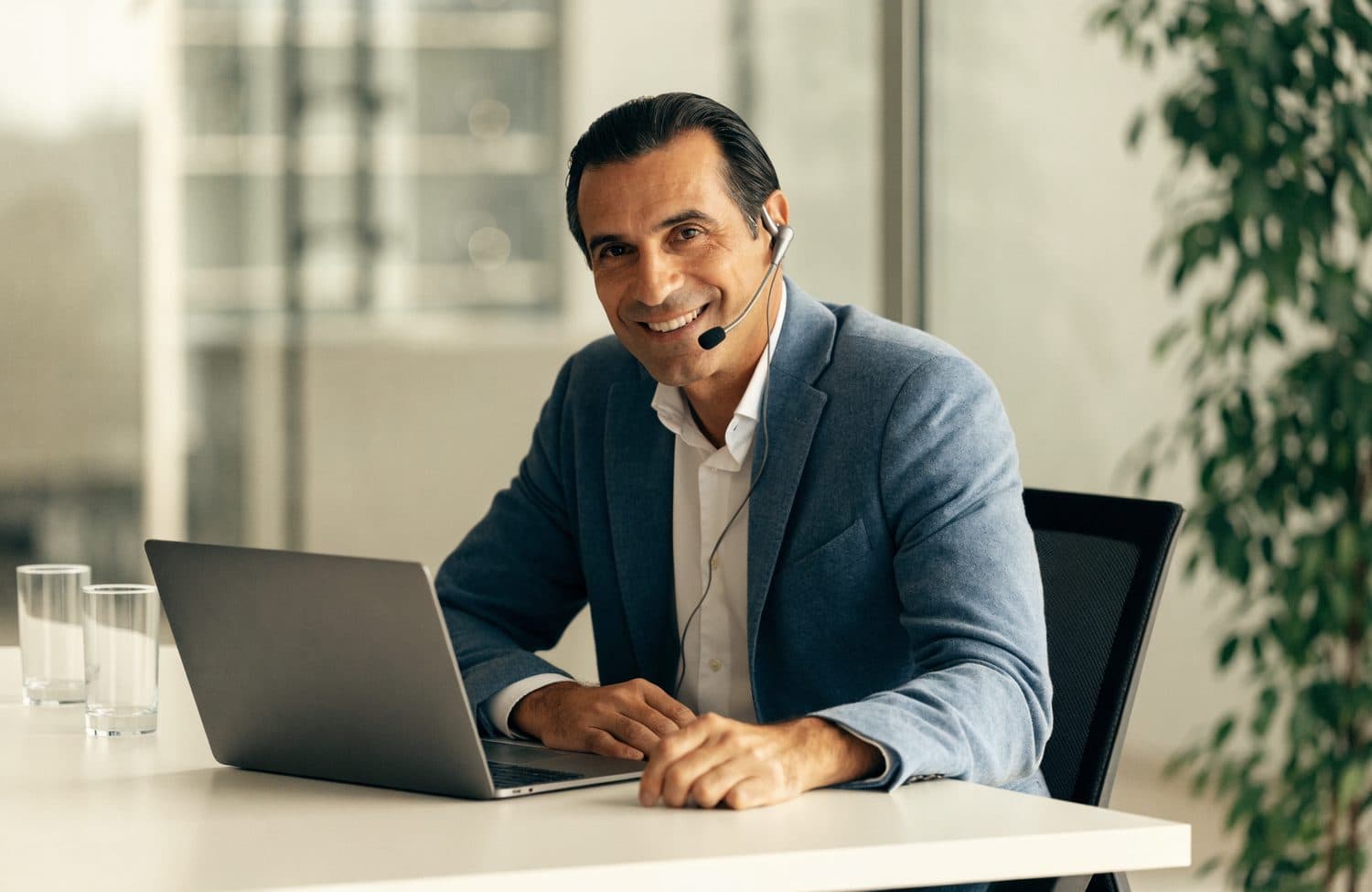 A licensed advisor at their desk, ready to take a call